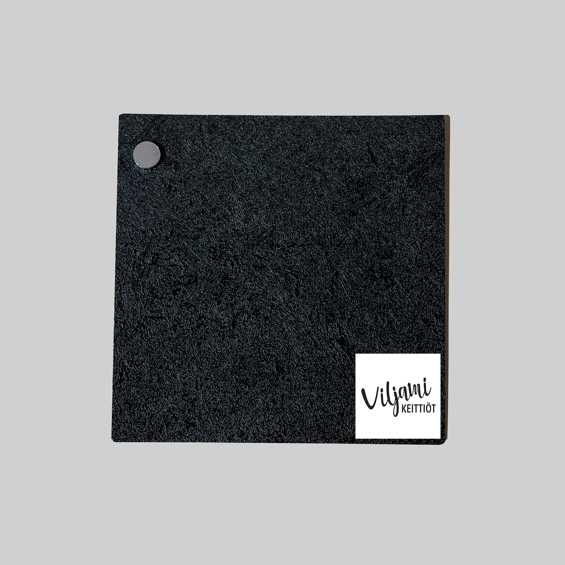 Mustan kiven näköinen laminaattitaso